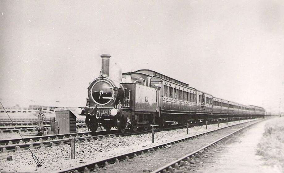 GWR large Metro tank 1411 and train, c 1905