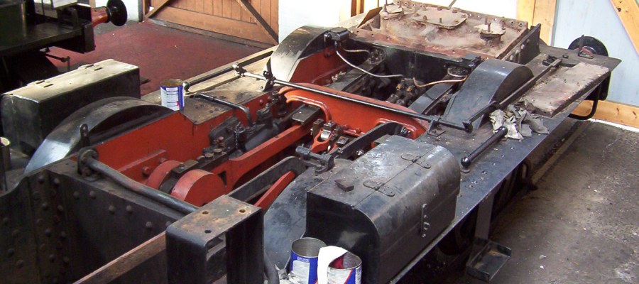 Venetian red connecting and valve gear on preserved Pannier tank