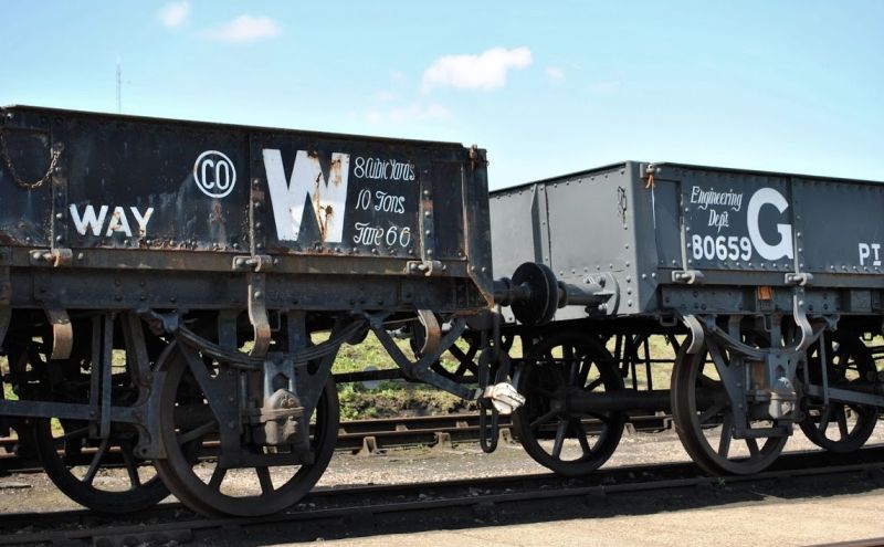 Black and grey GWR engineering wagons at Didcot, 2013