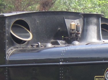 Pannier lubricator pipe cover at the cab end