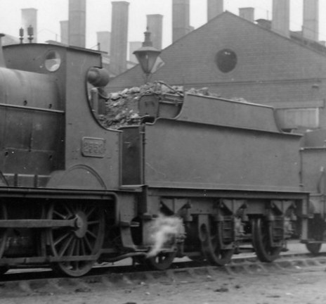 Vacuum-fitted 3000g tender with Dean Goods 2558 at Westbury, 1935